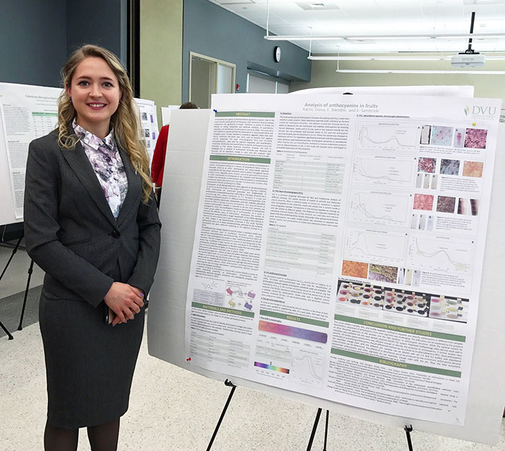Diana Rachii with her poster on fruit pigments.
