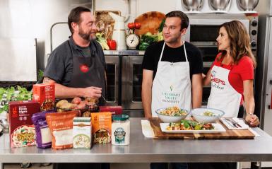 Chef Lee Chizmar and Tim Weingartner '24 on the set of Chef's Kitchen