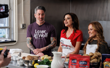 Kyra Mckeegan '25 and Michael Solomonov on the set of Chef's Kitchen 