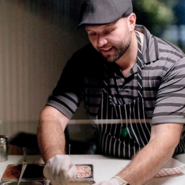 Cannoli Guy, Nick D'anna, making cannoli's in his shop. 