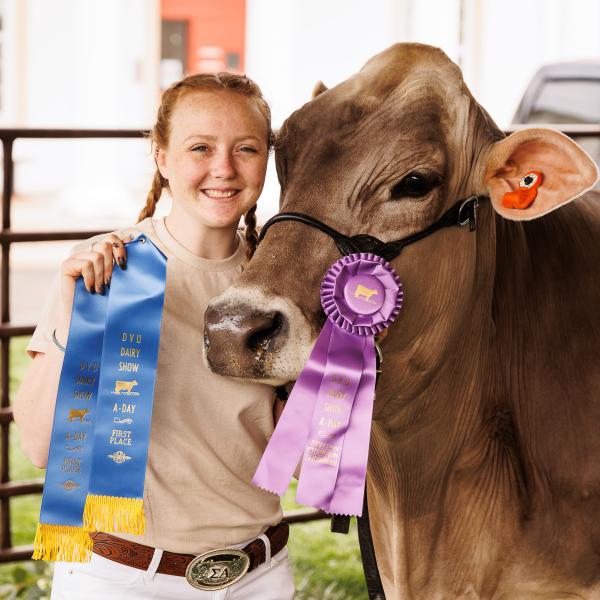 A student won a ribbon at the livestock show at A-Day, an annual delval tradition. 