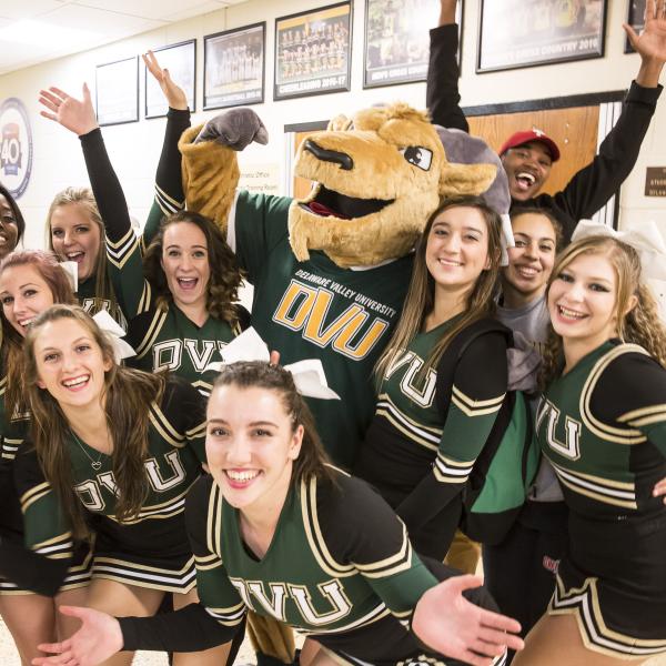 Cheerleaders from 2016 with Caesar the ram mascot.