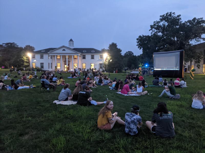 Students watch the episode of "The College Tour" featuring Delaware Valley University on the Quad.