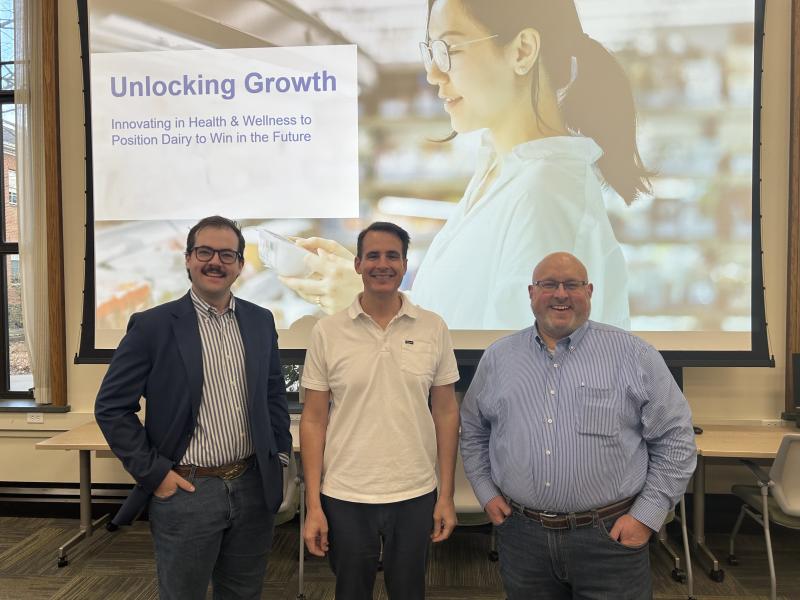 (L-R) Malcom Ellis ’26, Christopher Urban, senior vice president of growth platforms and partnerships at Dairy Management, Inc., and Dr. Broc Sandelin, dean of the School of Agriculture and Environmental Sciences.