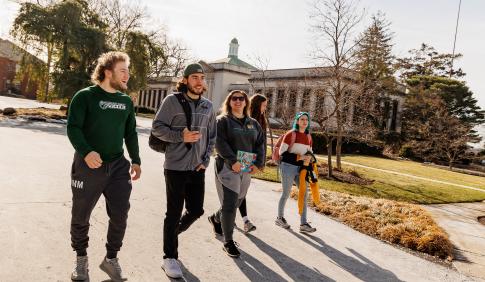 A group of students walking to class. 
