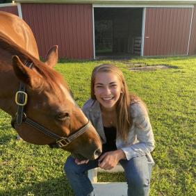Jalen Beach with a horse